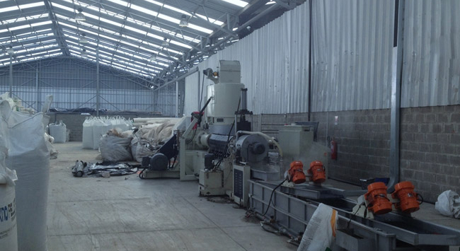 Plastic recycling machine operating in Chile
